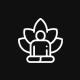 Person meditating with lotus on black background.